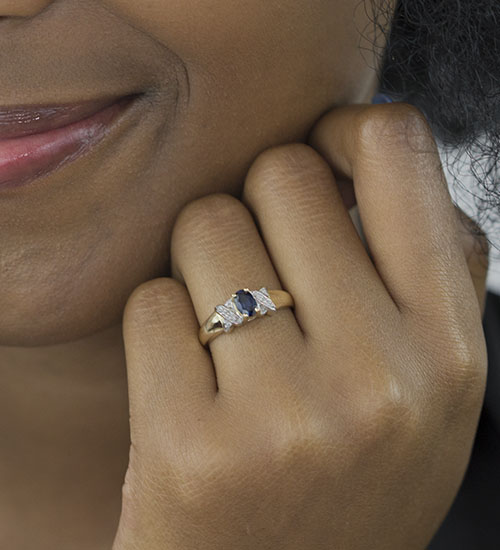 Zaveris Reverse Tapaered 9 Carat Yellow Gold Oval Cut Blue Sapphire and Diamond Ring