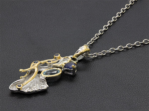 Zaveris Sterling Silver Blue and White Topaz Pendant